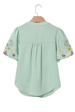 Load image into Gallery viewer, Clearly Aqua Floral Embroidered Puff Sleeve Split Neck Blouse
